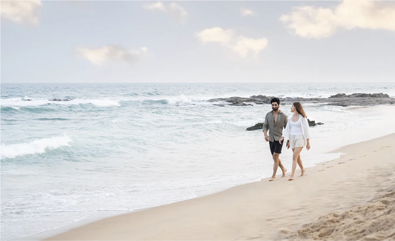 Private beach with couple walking